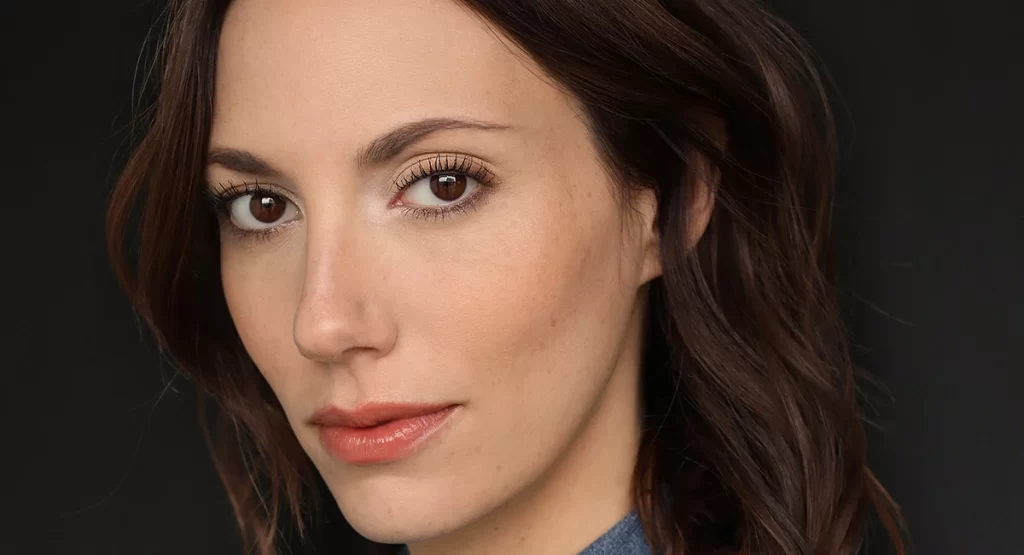 Alexis Jacknow, acclaimed filmmaker and director of the psychological horror feature "Clock," showcasing her multidisciplinary storytelling approach.