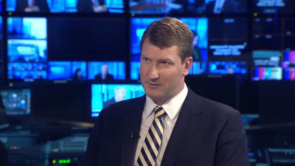 Matthew Glanville and Annunziata Rees-Mogg at their wedding in Lucca, Italy, smiling warmly in formal attire.