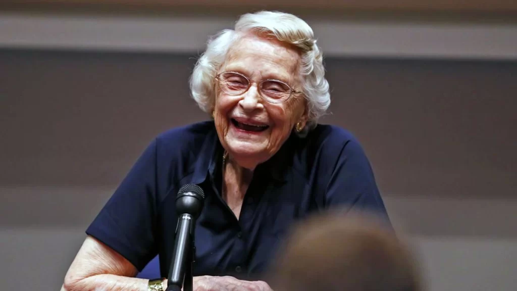 Virginia Halas McCaskey smiling at Bears game, principal owner legacy.