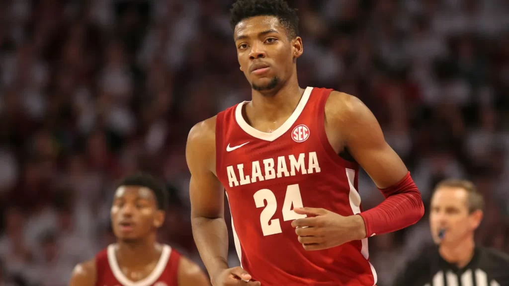 Brandon Miller playing for Alabama in 2023, before signing the largest guaranteed contract in Charlotte Hornets history.