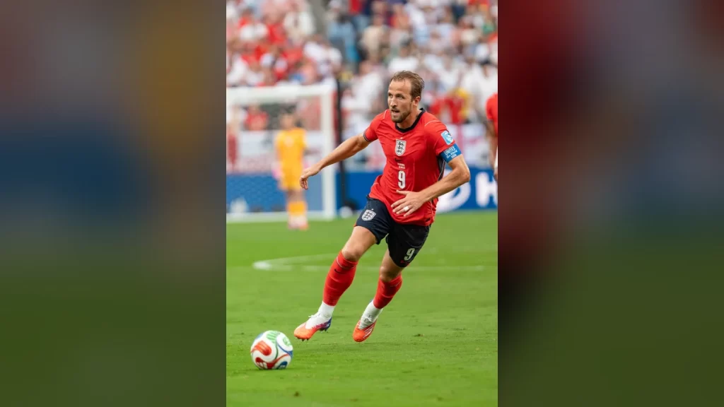 Harry Kane in England's red number 9 shirt with the captain's armband, dribbling the ball during the match against Panama at the 2026 World Cup.